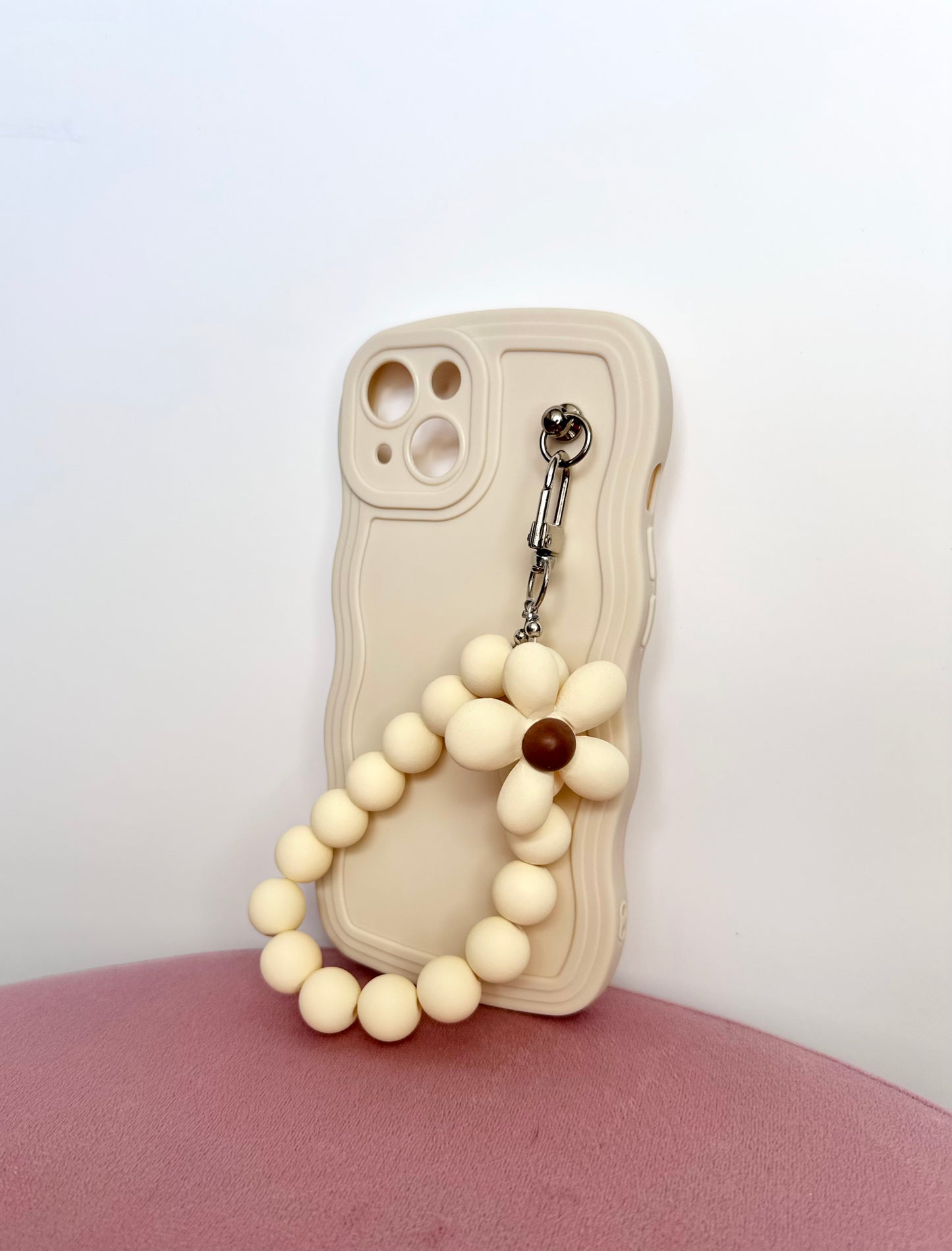 Wavy Edge Flower Pendant Cream Phone Case featuring a Chic Wrist Strap